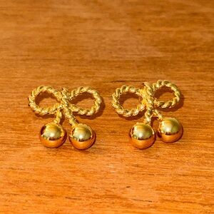 vintage gold tone joan rivers bow earrings